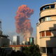 A picture taken on August 4, 2020 from the Hamra district in the center of the Lebanese capital Beirut shows a smoke plume rising following a huge explosion that rocked the Port of Beirut.